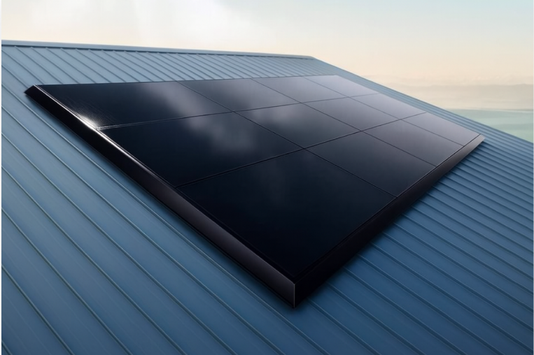 Close-up of sleek black solar panels installed on a metal roof.